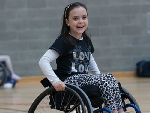 Tween girl on a wheelchair .jpg