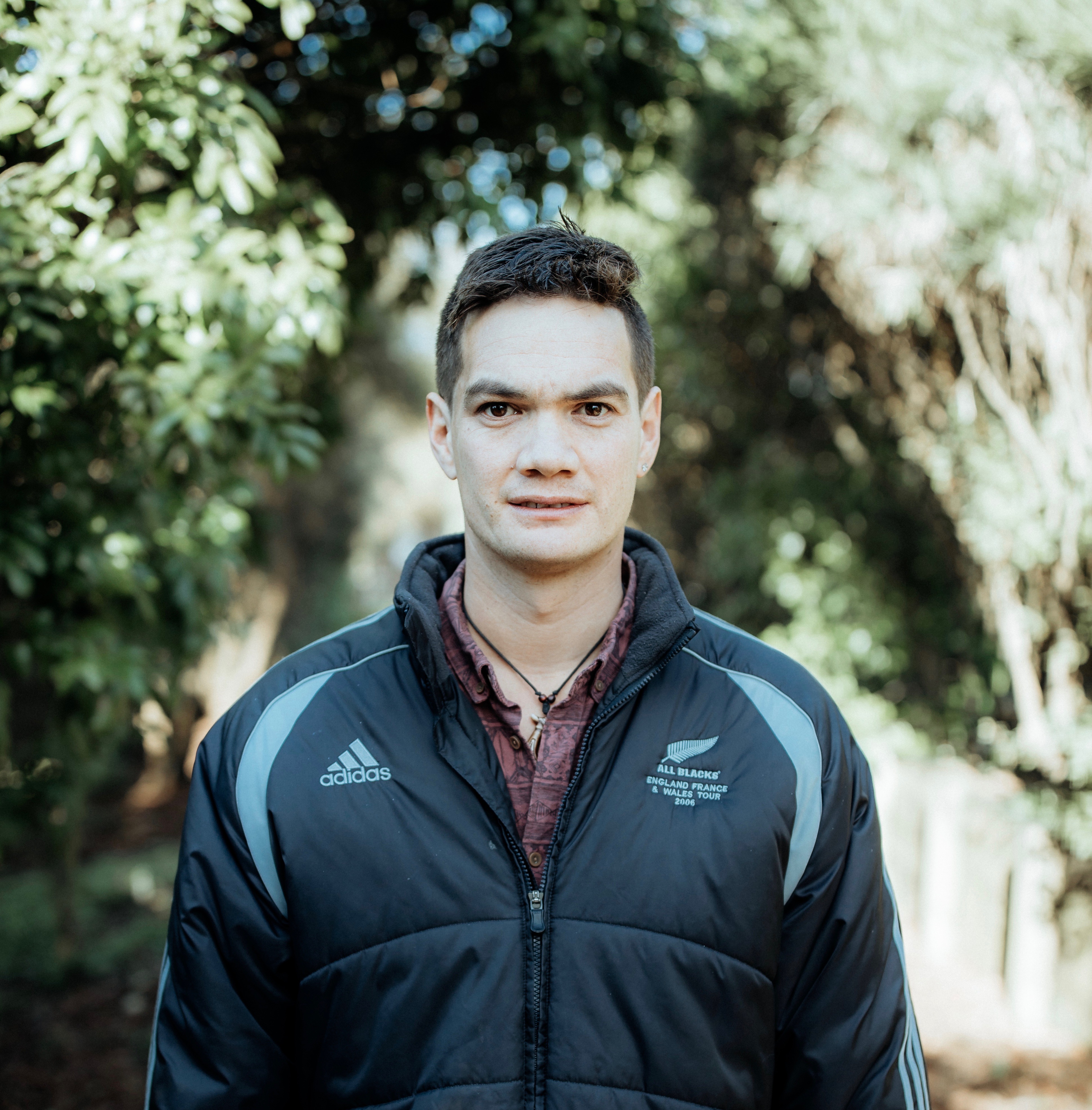 An adult man with ASD at the botanic garden