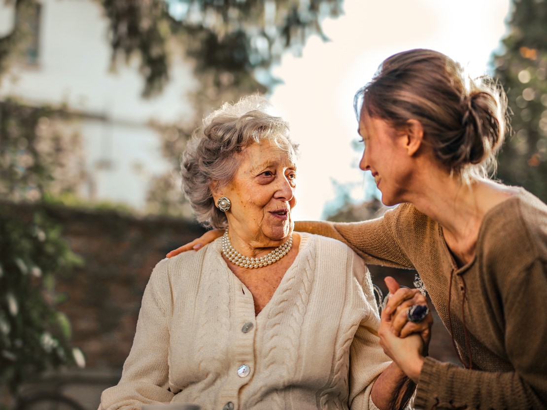 Elderly woman talking with a younger woman.jpg