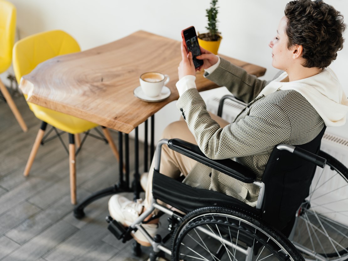 Wheelchair user using a cellphone.jpg