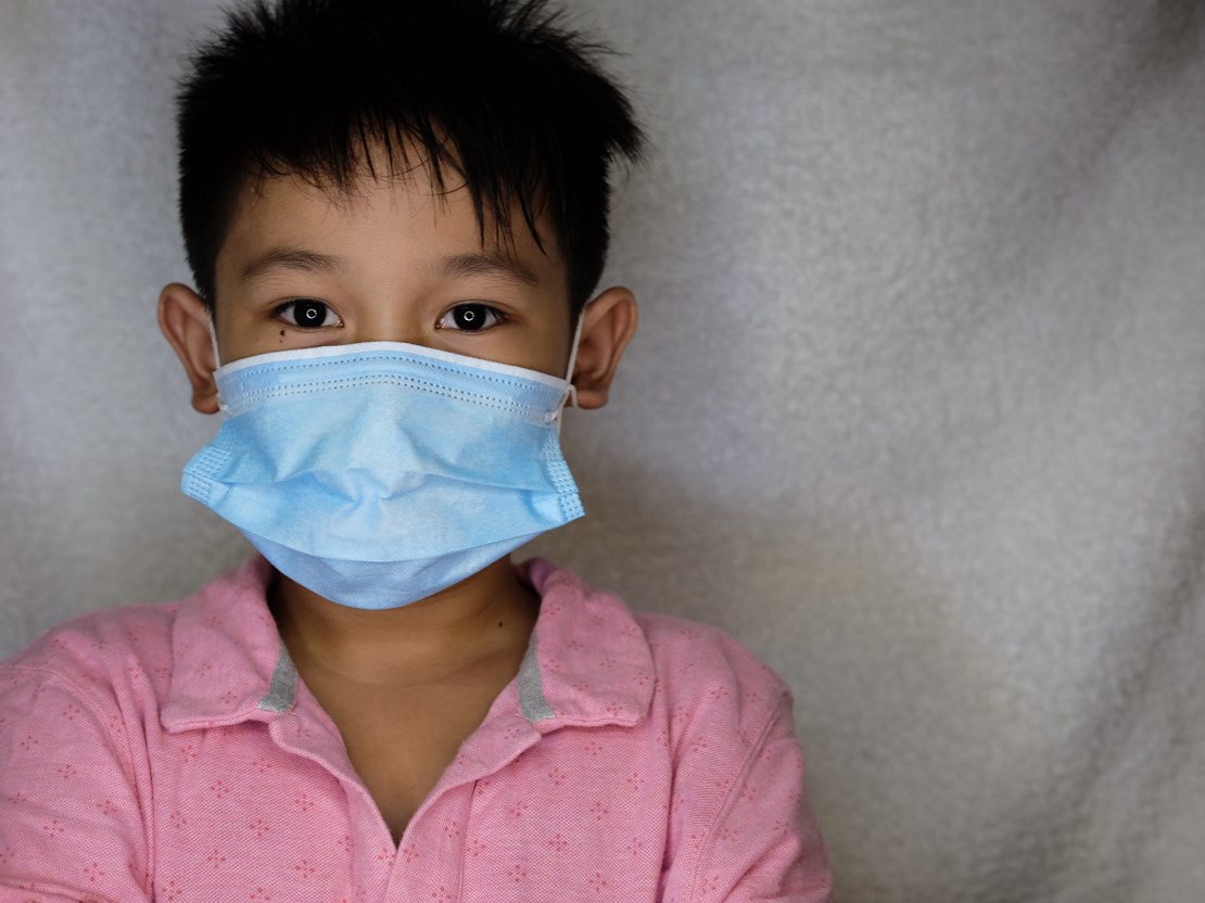 Young boy wearing a face mask.jpg